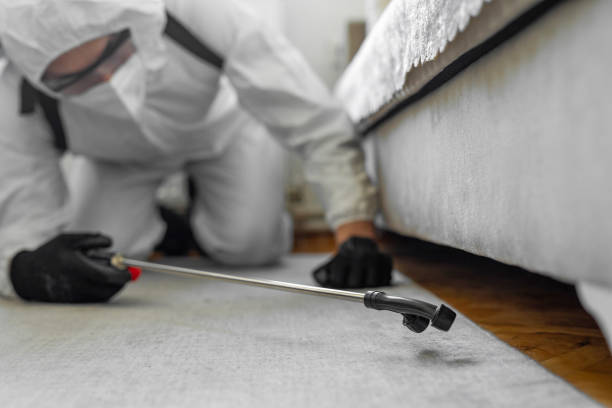 Professional Termite Control technician working in Grand Forks AFB, ND